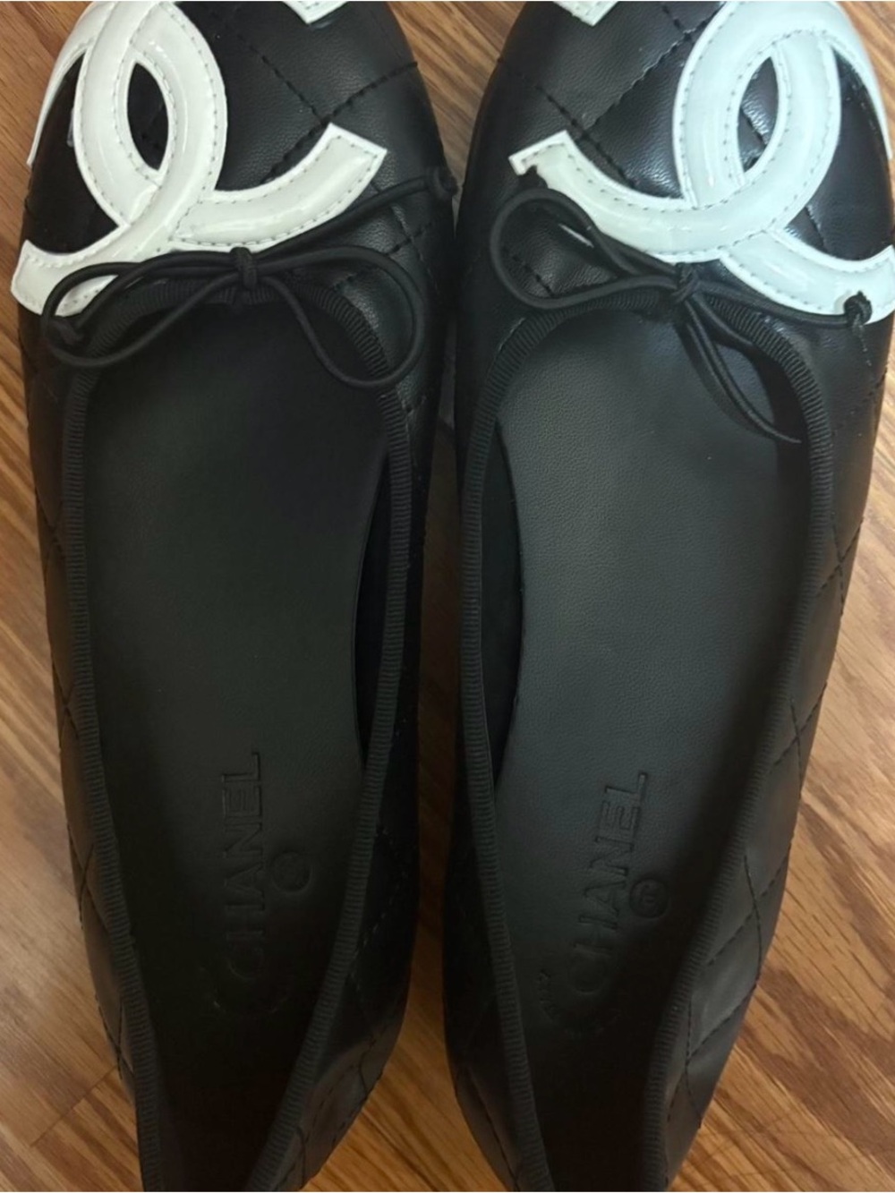 CHANEL Black Leather Quilted Ballet Flats with White CC Cap